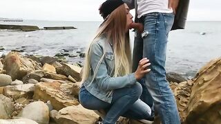 A blonde girl skillfully fucks with a man outdoors
